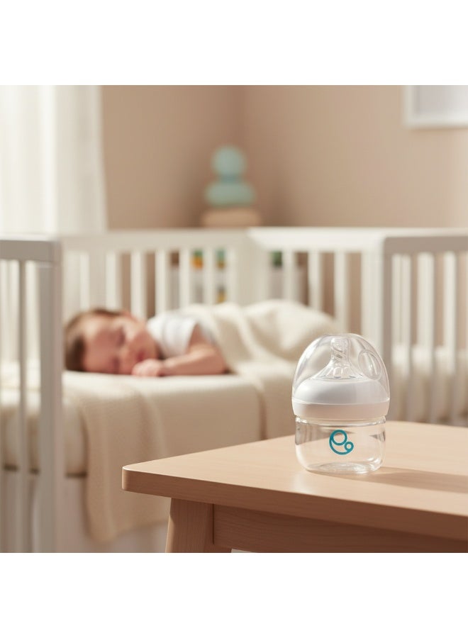 أمومي زجاجات رضاعة للأطفال حديثي الولادة، زجاجات مضادة للمغص مصنوعة من البولي بروبيلين، حلمة من مطاط السيليكون، حلمة عريضة تشبه حلمة الثدي، تدفق بطيء، لون أبيض، 60 مل - Image 2